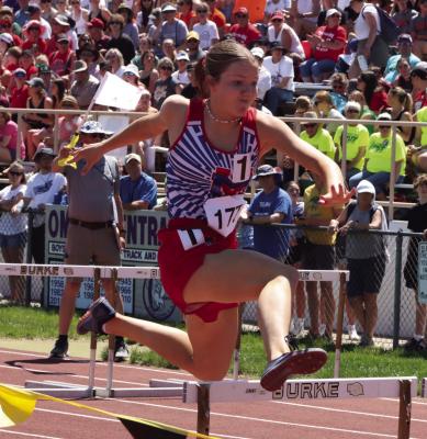Raider Stella Heapy competed in the 100 hurdles, 300 hurdles, and high jump at the state meet in Omaha.