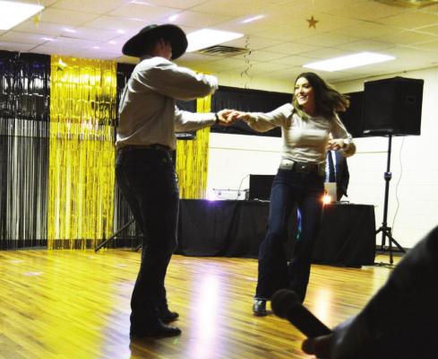 Oxford - Dexter and Laramey Becker Swing Dancing their way to the judges choice award winners at the Dancing Through the Generations Gala in Oxford on Saturday, March 20.