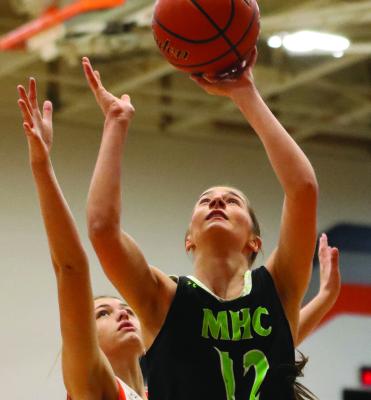 MHC’s Blayklee Farr scores inside.