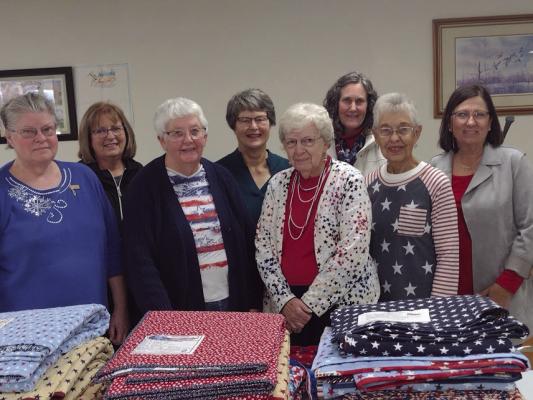 Members of the Prairie Quilts of Honor of Holdrege (pictured l-r) Joyce Kingsley, Deb Harms (both of Wilcox), Janet Kugler, Mary Kay Warner (Arapahoe), Ruth Johnson, Alice Erickson, Marilyn Ellner, and Carlene Schemper.