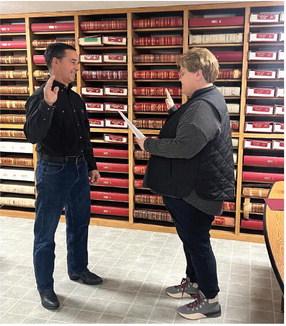 Kent Lehmann being sworn in by Clerk Magistrate Traci Loker