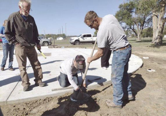 placing flag poles on veterans memorial