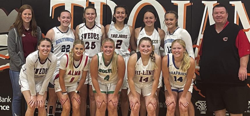 East girls, left to right, front to back: Kynlee Strauser, Addison Neal, Jersie Hermanson, Zoey Evans, Emerson Swanson, Caylin Barnett, Ellarey Harm, Jacey Kent, Lani Meier, and Bailey Truksa. Coach Schuett of Gothenburg and Coach Gilson of Cozad are on the far left and far right. Breelle Miller of Cambridge played for the West girls due to a last minute drop out.