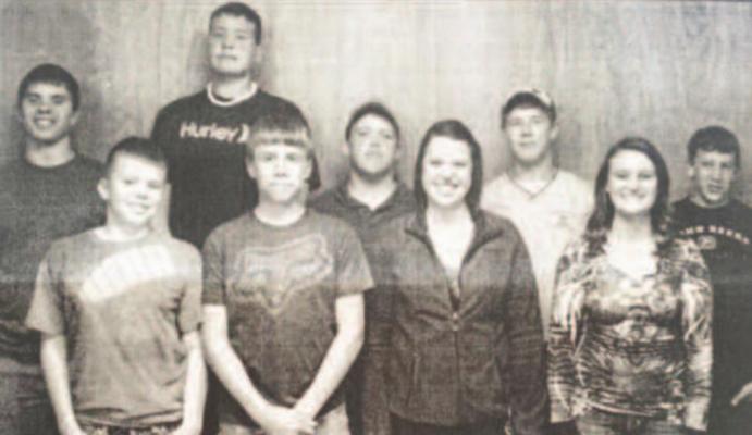 Junior Shooters senior high school members, front row l to r: Austin Krejdl, Logan Miller, Jennifer Sladky, Brooke Hays. Back row: Carl Kramer Jr., Spencer Kucera, Tom Percival, Tucker Bergquist, and Noah Hamre.