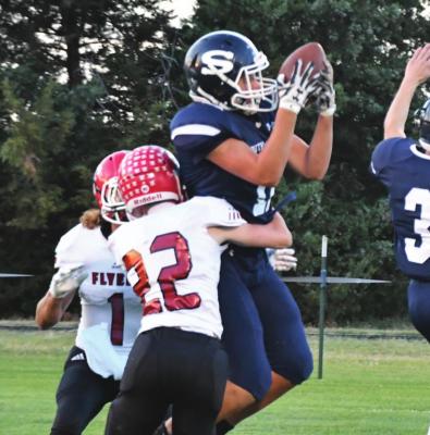 LEFT: Southwest’s Hunter Blume rises for a reception.
