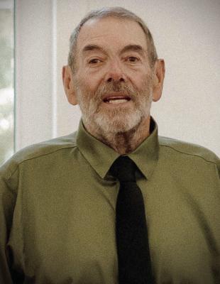 MARK E. HESKETT
