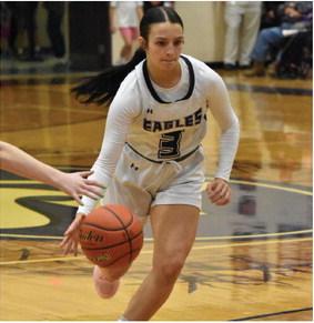 Southern Valley’s Brecklyn Hammond drives into the lane against Loomis.