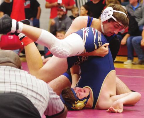 The Warriors’ Wyatt Jenkins earns a pin as part of a fourth-place finish Friday at Hi-Line.