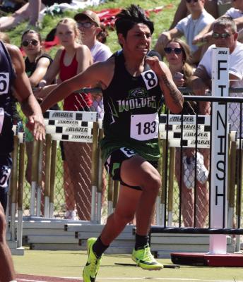 Carlos Romero of Maywood-Hayes Center qualified in the 100-meter dash.