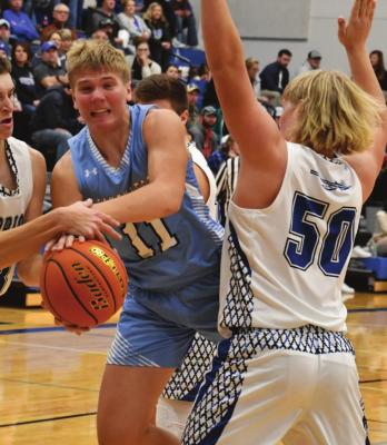 Southwest’s Hunter Blume is fouled on his way through the lane.