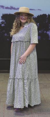 Coralee Schurr, daughter of Tyler & Kayelon Schurr, from Eustis, NE received a purple ribbon in the State Fair 4-H Fashion Show. She constructed &amp; modeled a dress for the STEAM Clothing Level 2 4-H project.