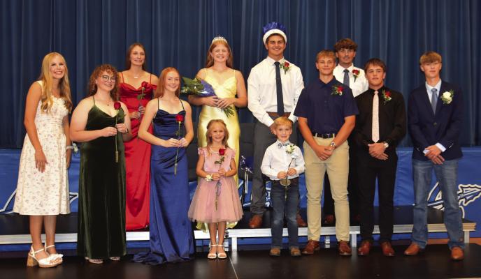 Arapahoe Homecoming royalty: Back (l-r) Princess Desi Farner, Queen Clara Hilker, King Trey Downey, Prince Hudson Sich. Front (l-r) Last year’s queen Emma Strand, Adelyn Hoefs, Ruby McCune, Crownbearers Reesly Spaulding and Sterling Helms, Aiden Roush, Briggs Hill and last year’s king Conner Shifflet.