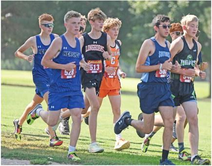 Boys runners at Chase County, including Southwest’s Austin Thompson, Maywood-Hayes Center’s Ryan Werkmeister and Cambridge’s Brady Ahlemeyer jockey for positioning in the race’s first mile.