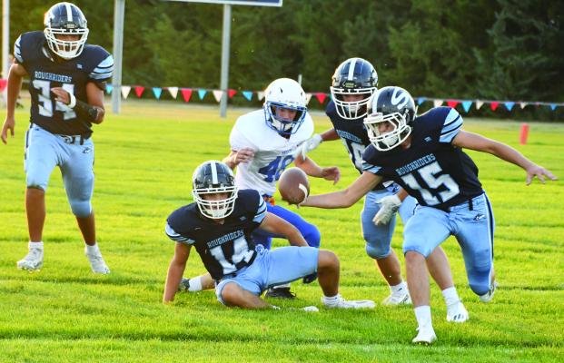 Southwest’s Kaden Day sanres the football to recover his own onside kick against South Platte Thursday.