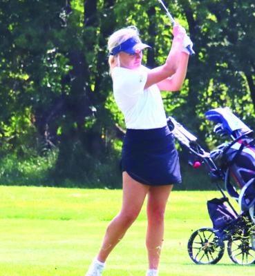 Cambridge’s Mileeya Monter takes an approach shot from the sixth fairway Thursday.