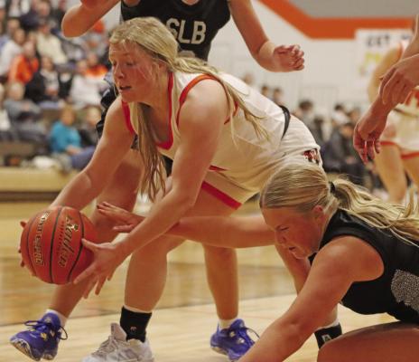 Cambridge’s Aspen Webb hustles for a loose ball.