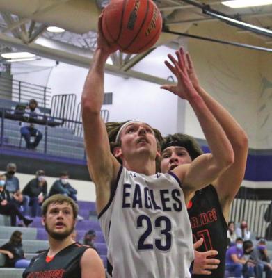 Southern Valley’s Carter Bose powers up for a layin.