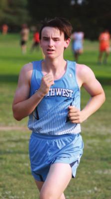 Southwest’s Cole Barnett, Cambridge’s Wyatt Jackson and the Trojans’ Brenna Deterding and Rachel Harris led their respective teams at the Chase County Invite Thursday.