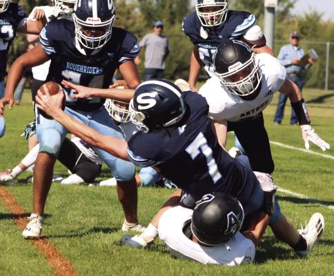 Southwest’s Nate Rippe extends the ball across the goal line for a touchdown.