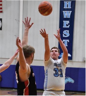 Southwest’s Alex Lashley launches a jumpshot from the head of the key.