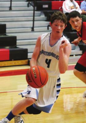 Southwest’s Nate Rippe drives baseline.