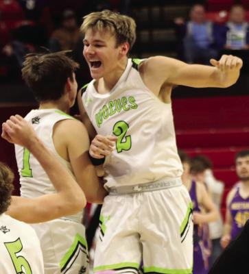 Right: Senior Gage Gerlach celebrates a state semifinal win with teammate Kody Schwenk.