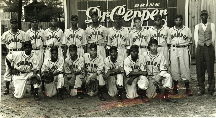 The Kansas City Monarchs, pictured here in 1948, were frequent visitors to Oxford, Nebraska. That year the barnstorming Monarchs defeated the Memphis Red Sox in a game played in Oxford. The contest is now believed to be one of the first major league games played in Nebraska following a 2020 decision by Major League Baseball to elevate the Negro Leagues to “Major League” status. Photo courtesy of the Negro Leagues Baseball Museum