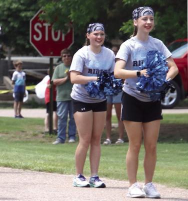 Two cheerleaders from Southwest Public Schools perform one of their dances during the Bartley Days parade.