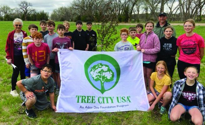 (Right) Cambridge 6th grade class participated in the annual Arbor Day Tree Planting at the Cambridge park