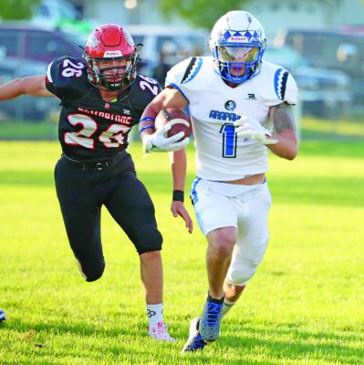 Warriors run past Trojans, 44-14