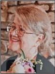 KITTY J. HARBISON