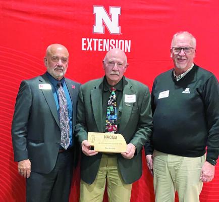 (L-R)- Dr. Charlie Stoltenow Nebraska Extension Dean &amp; Director, Dan Stehlik with the NACEB Outstanding Advocate Award, Dr. Larry Gossen NCTA Dean at the statewide Nebraska Association of County Extension Board meeting in Lincoln, NE.