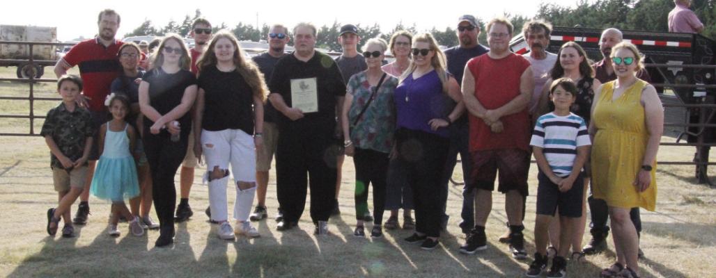 The Dickmeyer family stand with their award after the presentation in Elwood.