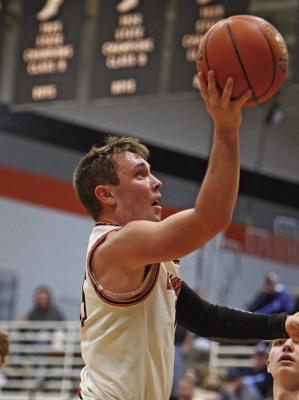 Trojans push Cardinals, fall by eight