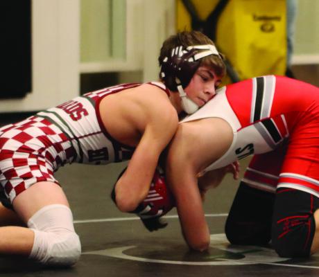 Hi-Line’s Connor Edwards works for a takedown in Saturday’s 106-pound finals at Arapahoe.