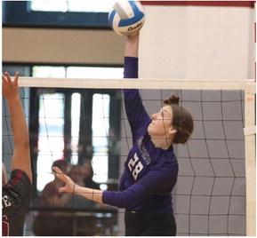 Southern Valley’s Tori Bose attacks a ball from the pin.