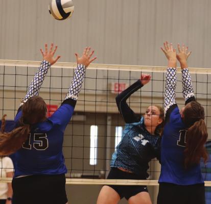 Southwest’s Avery McConville blasts an attack against the Arapahoe block.