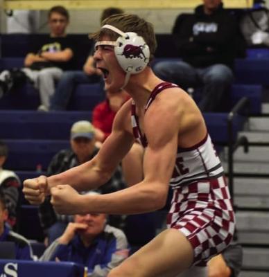 Hi-Line’s Grady Schutz celebrates an individual title.