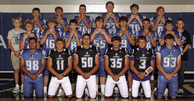 The Arapahoe Football team members are: Front Row L-R - Edgar Diaz, Wyatt Soncksen, Trey Downey, Hudson Sich, Briggs Hill, Kaydon Yeager; second row - Kallan Warner, Ryder Rask, Zach Einspahr, Ethen Hoard, Boede Soncksen, Gavin Andrews, Brigham Robinson; back row - Hayden Helms, Rigley McDonald, Wyatt Blickenstaff, Makaden Dunn, Teigen Franssen, Graham Sisson