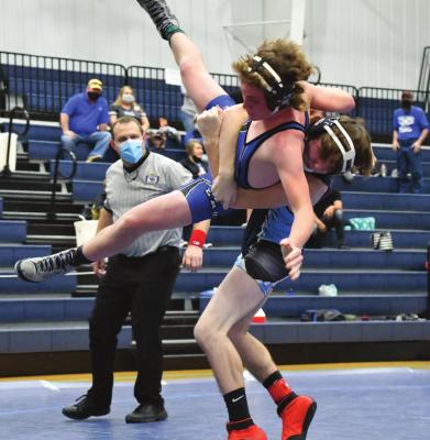 Southwest’s Jacob Kerns takes an opponent to the mat.