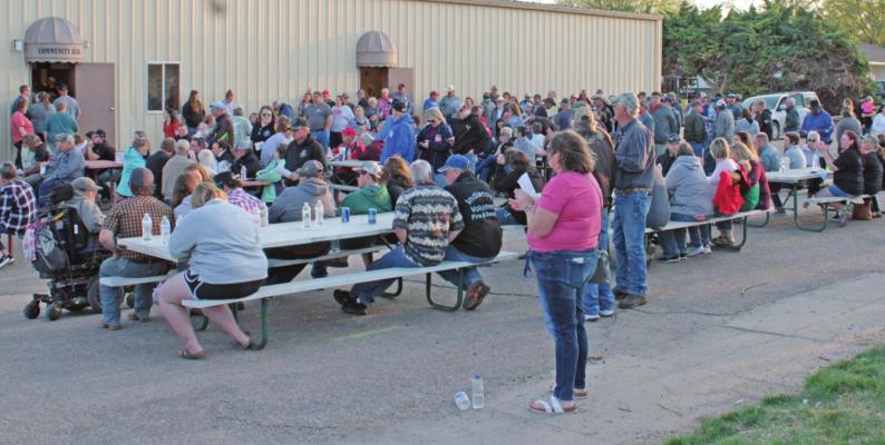 Benefit feed and auction raises $122,000