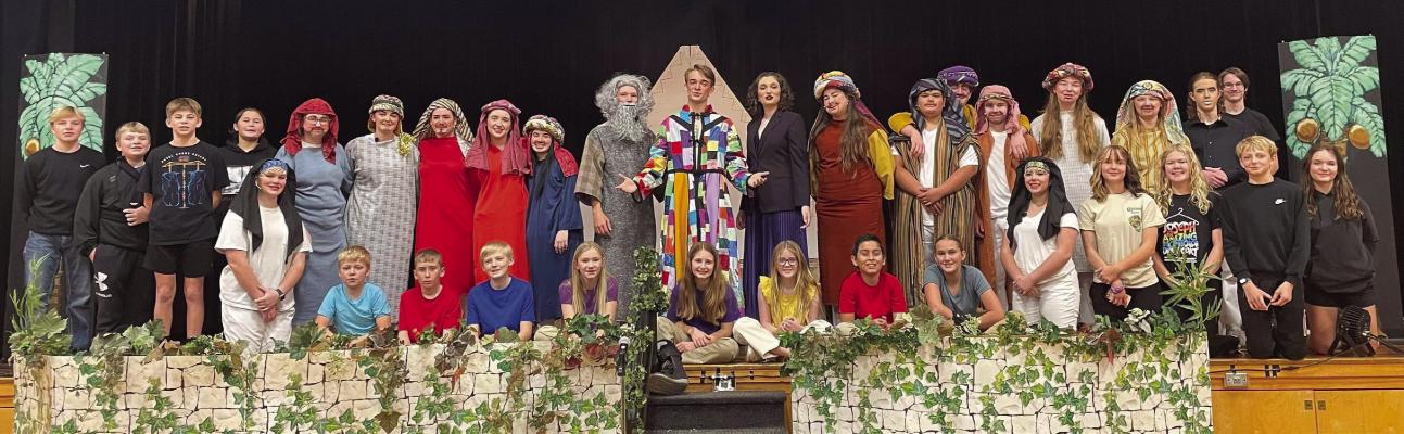 Cast and crew gathered for a photo