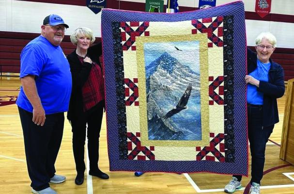 area veterans day programs: above, ed arends is presented a Quit of valor by the prairie Quilt guild at the elwood public schools veterans day program. Below left, steve towery, a veteran, addresses students at maywood public schools. Below right, elwood school students visit with veterans.