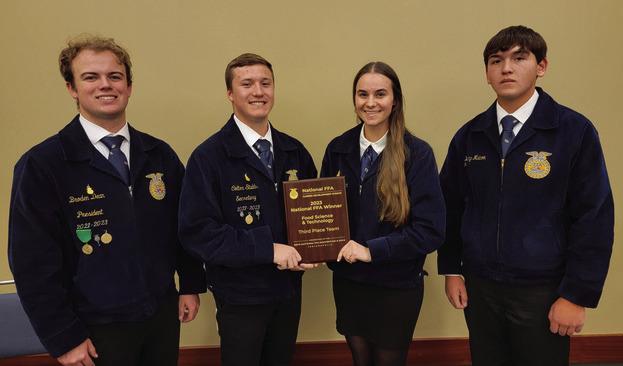 Eustis-Farnam Food Science & Technology Team members Broden Dean, Colton Stubbs, Genesee Knackstedt, and Westyn Malcom hold their third place plaque after leaving the national stage.