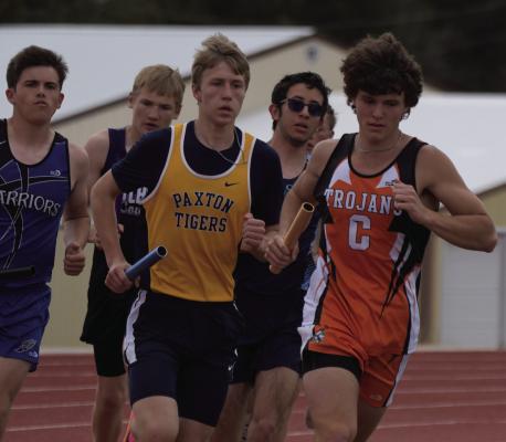 Cambridge’s Wyatt Jackson leads a pack of runners that includes Arapahoe’s Campbell Schutz and Southwest’s Austin Thompson.