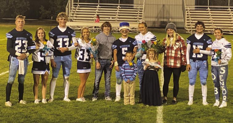 The 2022 Southwest Homecoming Court is pictured as follows: Hunter Cunningham, Delanie Critchfield, Kaiden Ruggles, Gracie Fries, 2021 Homecoming King Jacob Kerns, 2022 Homecoming King Carter Van Pelt, 2022 Homecoming Queen Bailey Truksa, 2021 Homecoming Queen Kassidy Wilcox, Kaden Day, Avery Broomfield.