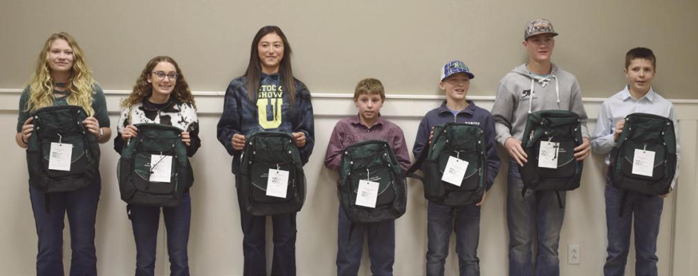 Champion Showmanship 4-h members work hard while in the ring and Bryan Nelson and Security First Bank recognized them. Receiving backpacks were Ashlyn Wendell, Aubrey High, Brodie Heying, Dillon Heath, Dylan Wendell, Grace Andrews, Gracey Hinson, Grady Schutz, Kamrynn Rhodes, Karter Barnes, Matthew Rhoades