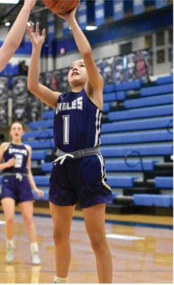 Eagle Vanesa Aguayo pulls up for a lay up.