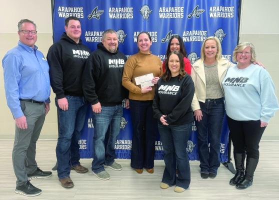 mnB insurance Services, inc. and mnB Realty donates $2,100 to the Arapahoe-Holbrook backpack program