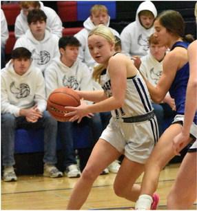 Southern Valley’s Natalee Holste drives the paint.